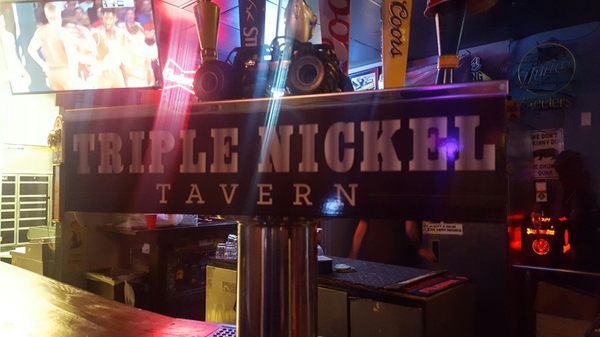 Photo of Triple Nickel Tavern - Colorado Springs, CO, US. a bar with neon signs