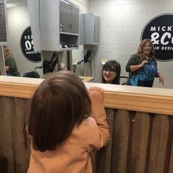 Mickey & Co Hair Designs - Peeking at sister getting a cut/style with Brittany.