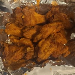 Tangy Tomato Pizzeria - 10 hot wings, Tangy Tomato.