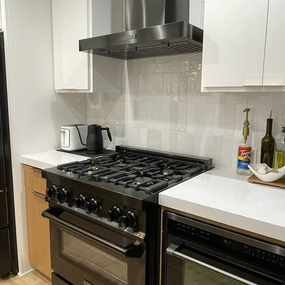 Aztec Tile & Granite - Stove - General Contractors Near Me