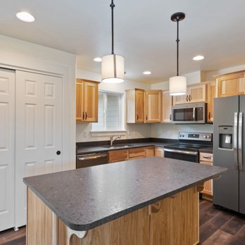 Terry Homes - a kitchen with stainless steel appliances - General Contractors Near Me - Kalispell, Montana Terry Homes - a kitchen with stainless steel appliances - General Contractors Near Me - Kalispell, Montana