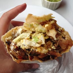 My delicious and generously stuffed with shredded pork burrito. My delicious and generously stuffed with shredded pork burrito.