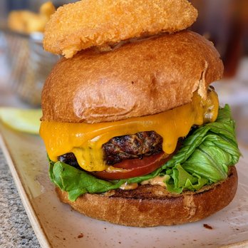 NINETEEN at TPC Sawgrass - Burger. $19. 8 oz signature house ground beef, secret sauce, cheddar, brioche bun, French fries. Nineteen at TPC Sawgrass. - American Near Me - Ponte Vedra Beach, Florida