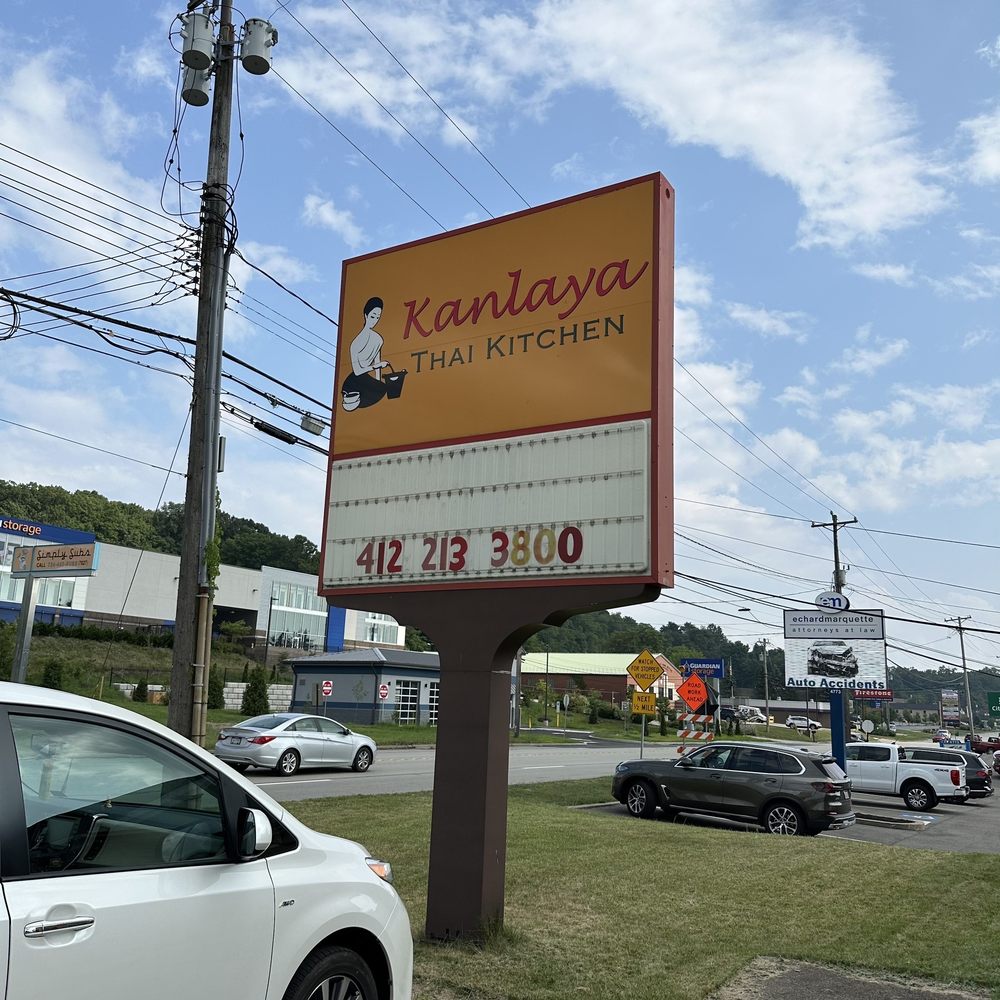 a sign for a restaurant a sign for a restaurant