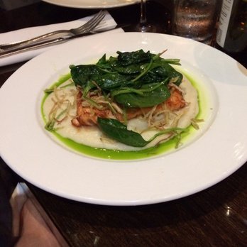 Laboratorio Kitchen - salmon entree with the mushroom risotto in the back - Italian Near Me - Montclair, New Jersey