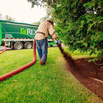 Rexius - Commercial blower application of playground chips - Landscaping Near Me - Lake Oswego, Oregon
