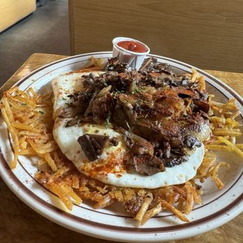 Pine State Biscuits - Hash up with added over medium eggs. - Breakfast & Brunch Near Me - Portland, Oregon Pine State Biscuits - Hash up with added over medium eggs. - Breakfast & Brunch Near Me - Portland, Oregon