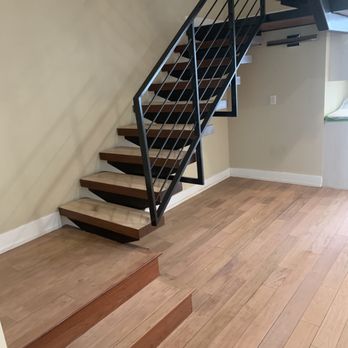 Main Line Hardwood - Custom treads with metal handrail and spindles - Flooring Near Me - Devon, Pennsylvania