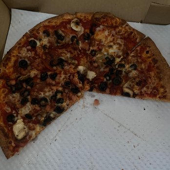 Pizza Garden - Notice how there's no grease on paper lining.... I got the Canadian with olives added. - Pizza Near Me - New Westminster, British Columbia Pizza Garden - Notice how there's no grease on paper lining.... I got the Canadian with olives added. - Pizza Near Me - New Westminster, British Columbia