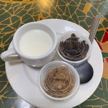 Lily's Beachside Restaurant - Milk, brown sugar, and raisins for the oatmeal. - Breakfast & Brunch Near Me - Satellite Beach, Florida Lily's Beachside Restaurant - Milk, brown sugar, and raisins for the oatmeal. - Breakfast & Brunch Near Me - Satellite Beach, Florida