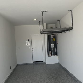 Garage Pros 1 - Garage floor and rack 1 - Flooring Near Me