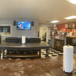 The Sweet Escape - Main room, places to sit, eat, and watch Tv. Room to the left is another room great for relaxing or having a small meeting.