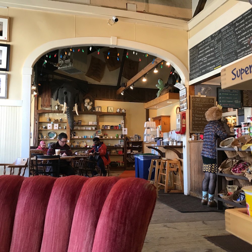 Coffee Obsession - Main entrance area with spacious seating area in the back. - Coffee & Tea Near Me - Falmouth, Massachusetts Coffee Obsession - Main entrance area with spacious seating area in the back. - Coffee & Tea Near Me - Falmouth, Massachusetts