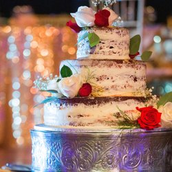 Kat's Cakes - Our cake was a semi-naked, red velvet with chocolate chips and cream cheese icing. YUM!