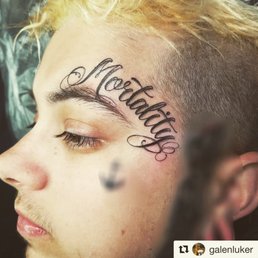 Script tattoo.