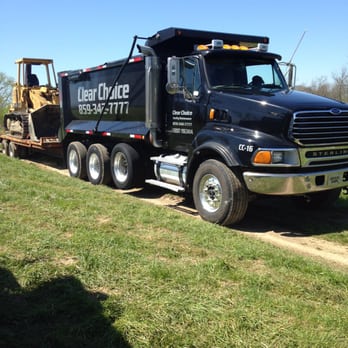 Clear Choice Facility Maintenance - a black dump truck - Landscaping Near Me - Covington, Kentucky