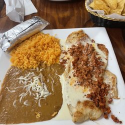 Dos Reynas Mexican Restaurant - Chicken topped with chorizo queso
