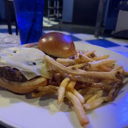 Buddy's Blackened Blues Burger with Swiss cheese.