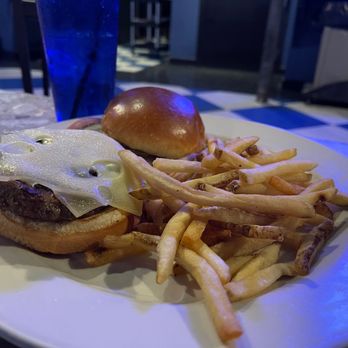 Buddy Guy's Legends - Buddy's Blackened Blues Burger with Swiss cheese. - Jazz & Blues Near Me - Chicago, Illinois