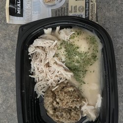 Kwik Trip - Scraps of turkey, brown scoop of dressing& mashed potatoes swimming in a pool of salty gravy