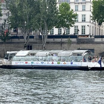 Batobus - One of the boats at a pick up point. - Transportation Near Me - Paris, 75 Batobus - One of the boats at a pick up point. - Transportation Near Me - Paris, 75