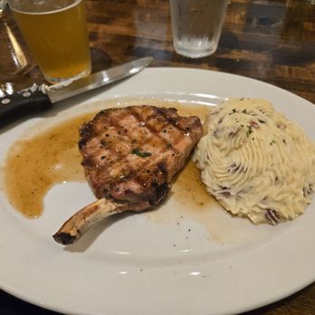 The Library Restaurant & Pub - Maple bourbon pork chops - Steakhouses Near Me - Indianapolis, Indiana The Library Restaurant & Pub - Maple bourbon pork chops - Steakhouses Near Me - Indianapolis, Indiana