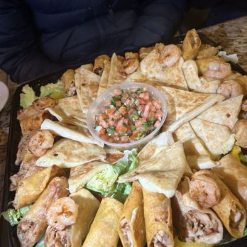 Mi Pueblo Mexican Grill - Catering platter with chicken and bacon, taquitos and cheese quesadillas with pico de gallo - Mexican Near Me - Clemmons, North Carolina