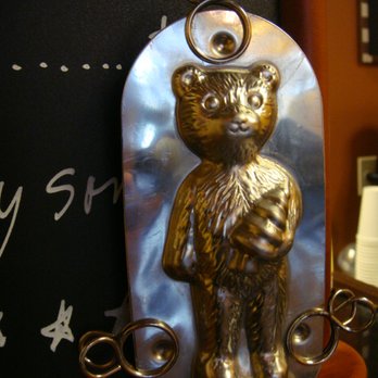 Ambiance Chocolat - a teddy bear with a baby in its arms - Chocolatiers & Shops Near Me - Toronto, Ontario