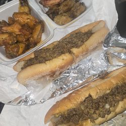 Sauced - Cheesesteaks, garlic parm and house sauce wings. Barely any sauce on the wings. No steaks used, they used ground beef. Disgusting