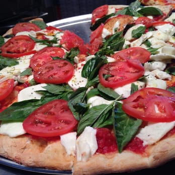 Christians Pizza - Fresh mozzarella: san marzano tomato base sauce, fresh mozzarella, fresh basil, fresh plum tomatoes, evoo. - Pizza Near Me - Richmond, Virginia