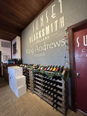 Photo of Sunset Suisun - Fairfield, CA, US. a wine rack with wine bottles