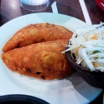 Mi Casa De Sabor Bar & Grill - empanada with curtido - Spanish Near Me - Houston, Texas Mi Casa De Sabor Bar & Grill - empanada with curtido - Spanish Near Me - Houston, Texas