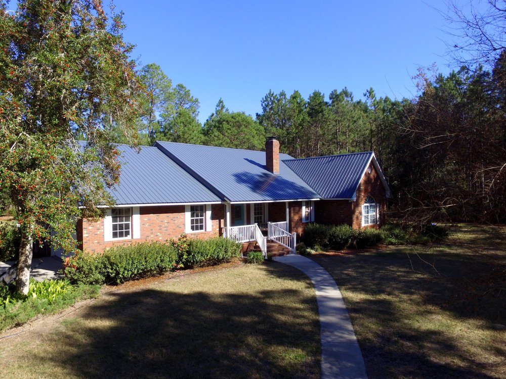 Slide of TMT Roofing