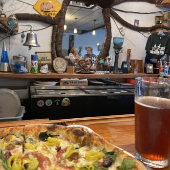 The Green Room - The Greek pizza with sausage on one side. Amber ale. - Pizza Near Me - Mableton, Georgia The Green Room - The Greek pizza with sausage on one side. Amber ale. - Pizza Near Me - Mableton, Georgia
