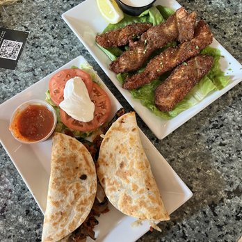 Logan 11 Bar and Kitchen - Chicken tenders and quesadilla - Bars Near Me - Chicago, Illinois Logan 11 Bar and Kitchen - Chicken tenders and quesadilla - Bars Near Me - Chicago, Illinois
