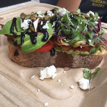 The Goods - Avocado toast with extras: egg, bacon and goat cheese - Donuts Near Me - Carlsbad, California The Goods - Avocado toast with extras: egg, bacon and goat cheese - Donuts Near Me - Carlsbad, California