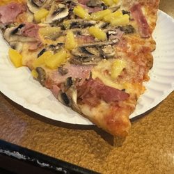Jungle Prada Tavern - A slice with pineapple mushrooms and ham. I