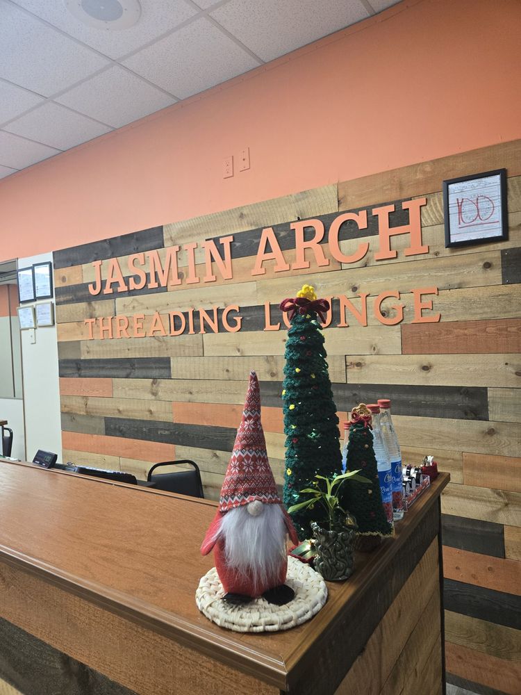 Jasmin Arch Threading Lounge Logo