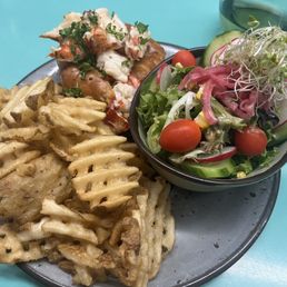 Lobster roll, waffle fries, house salad Lobster roll, waffle fries, house salad