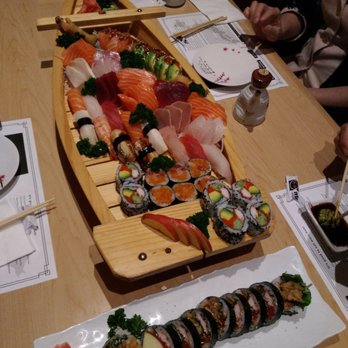 Mi Ne Sushi - The small boat and a spider roll, for three people it was a lot!! - Sushi Bars Near Me - Aurora, Ontario Mi Ne Sushi - The small boat and a spider roll, for three people it was a lot!! - Sushi Bars Near Me - Aurora, Ontario