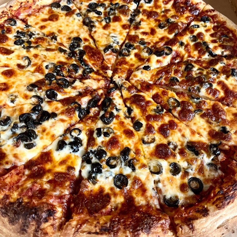 Pizza Plaza Restaurant - Black olive pizza - Pizza Near Me - Anchorage, Alaska