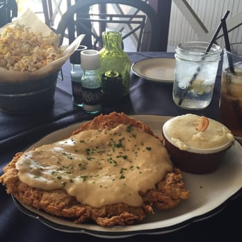 Moonshine Grill - The chicken fry with garlic mash. Piping hot, and just the right amount of spice. - Southern Near Me - Austin, Texas Moonshine Grill - The chicken fry with garlic mash. Piping hot, and just the right amount of spice. - Southern Near Me - Austin, Texas