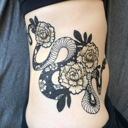 Jagua and henna-jagua mix snake and peony design by Melanie Jagua and henna-jagua mix snake and peony design by Melanie