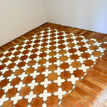 Fuentes Tile LLC - Clay tiles made in Mexico, the tiles were installed at a main entrance making a frame in the shape of a mat. - Flooring Near Me Fuentes Tile LLC - Clay tiles made in Mexico, the tiles were installed at a main entrance making a frame in the shape of a mat. - Flooring Near Me