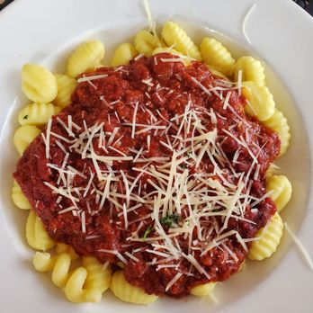 Capri di Nuovo - Gnocchi with meat sauce - Italian Near Me - West Allis, Wisconsin Capri di Nuovo - Gnocchi with meat sauce - Italian Near Me - West Allis, Wisconsin