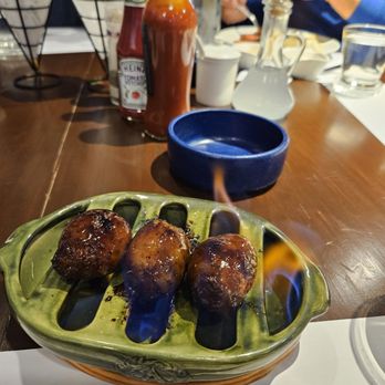 Breakfast At Antonio's - Housemade Longanisa with flaming rum. This was DELICIOUS - Breakfast & Brunch Near Me - Tagaytay, CAV