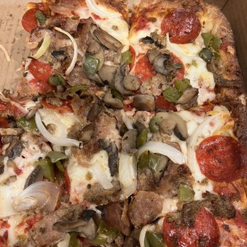 Pizza Suprema - The Sicilian Suprema (my husband grabbed his first piece before I could even get a pic!) Delicious! - Pizza Near Me - Lutz, Florida Pizza Suprema - The Sicilian Suprema (my husband grabbed his first piece before I could even get a pic!) Delicious! - Pizza Near Me - Lutz, Florida