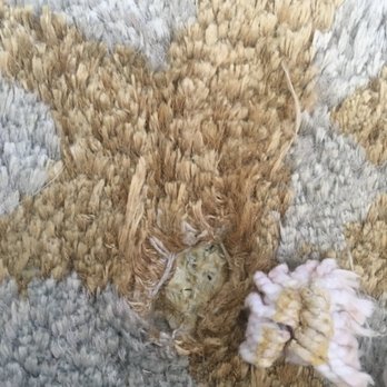 "Bleached" out spot where pile comes out