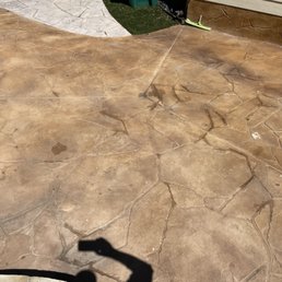 Around our pool, you will notice stain peeling off and whites specks where it is washing away. Around our pool, you will notice stain peeling off and whites specks where it is washing away.