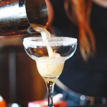 Pho & Co - a bartender pouring a drink - Asian Fusion Near Me - Rosemère, Quebec